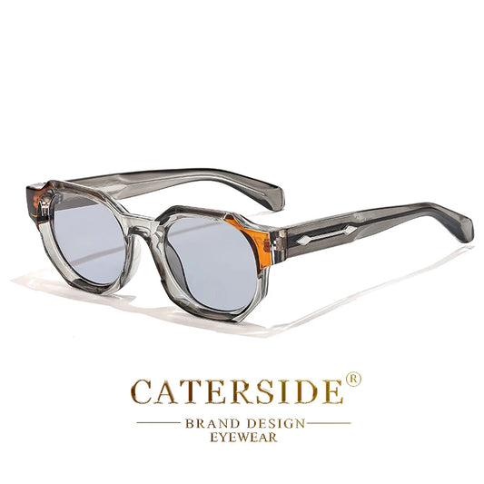 Lunettes de soleil transparentes avec accents orange et verres gris de la marque Caterside