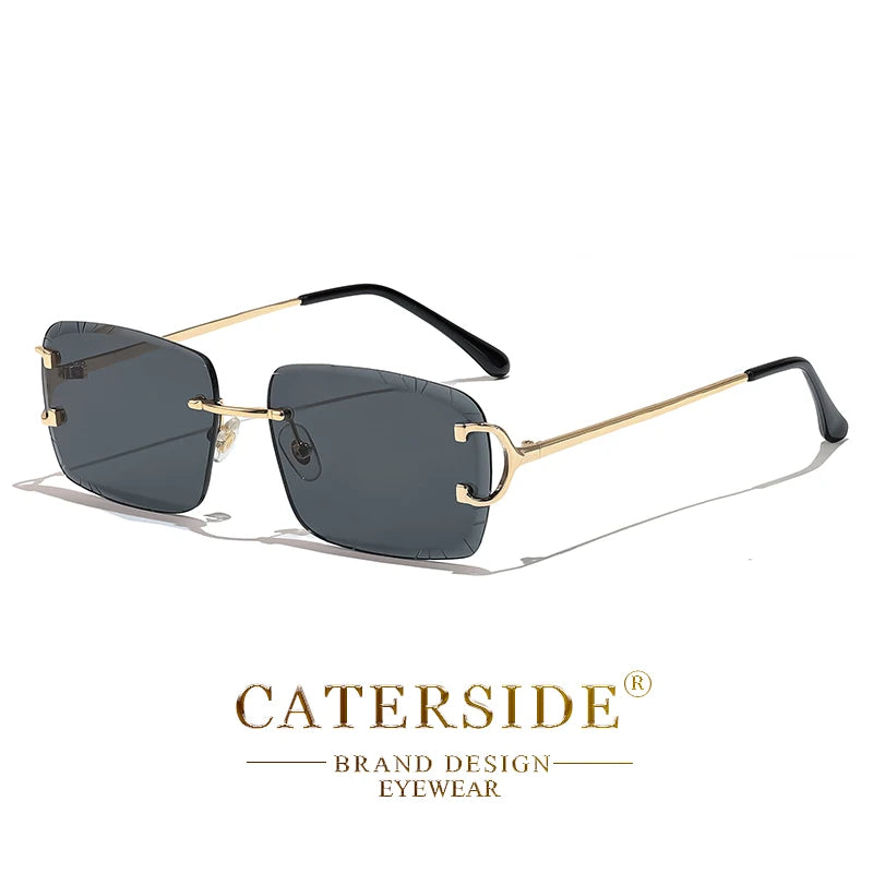 Lunettes de soleil carrées à monture dorée fine et verres teintés gris foncé