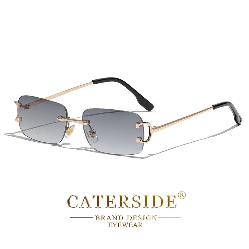 Lunettes de soleil sans monture à verres dégradés gris et branches dorées avec embouts noirs
